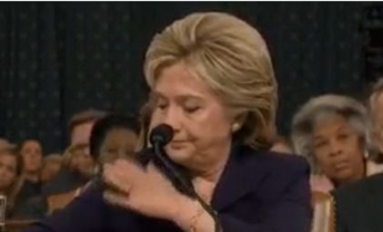 Hillary Clinton brushing her sleeve at Benghazi hearing