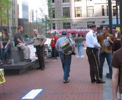 sheriff and deputy chatting with protesters at Occupy MN