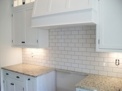 Adhesive Backsplash Tiles on Shade Of White Subway Tile Backsplash With White Cabinets   Kitchens